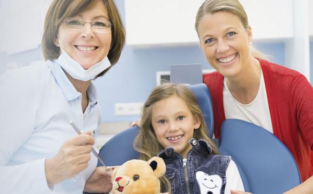 Dentist with patients